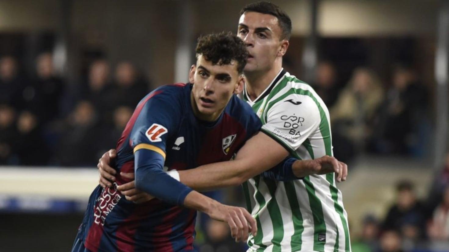 Partido de fútbol en directo por televisión