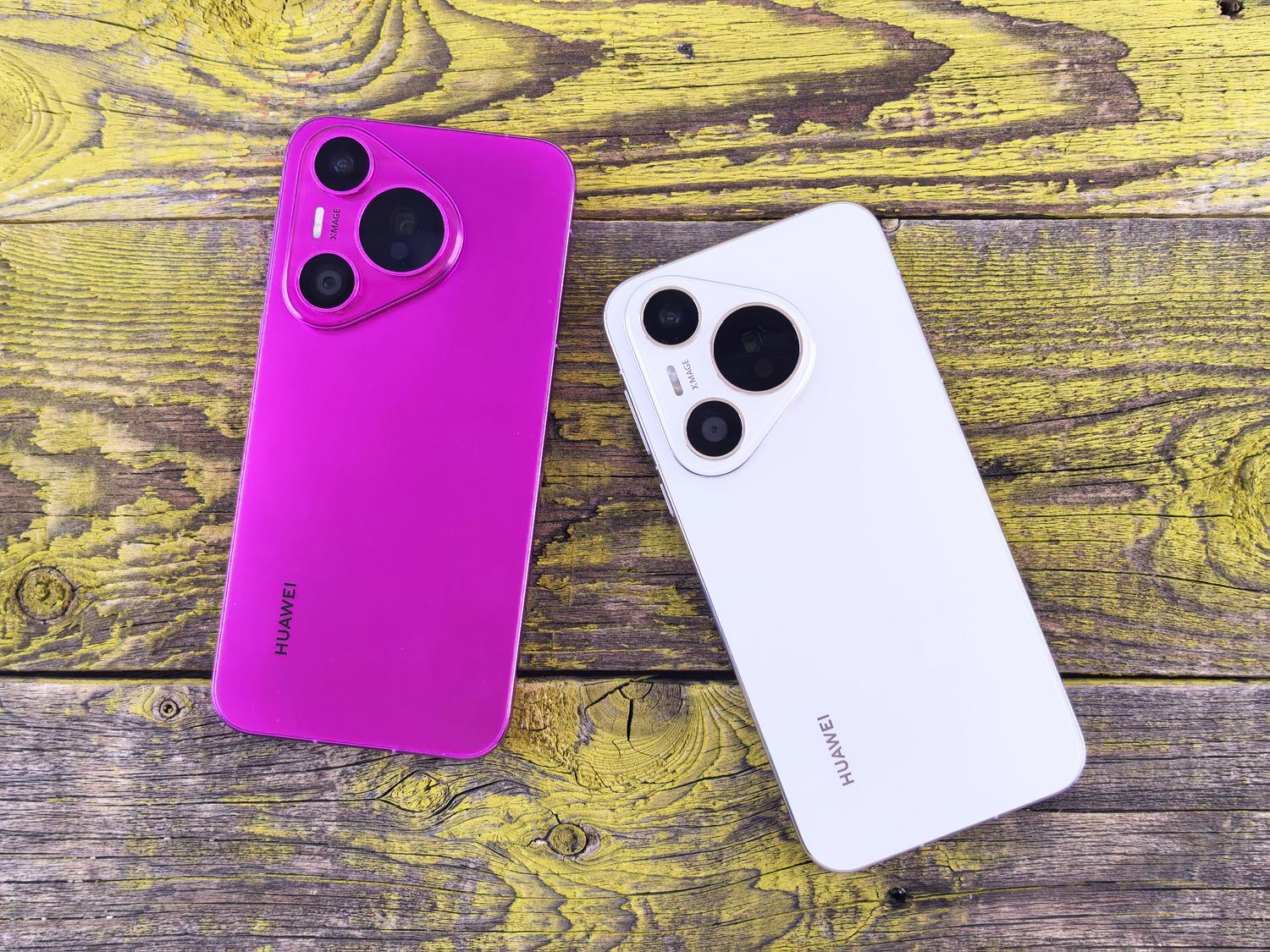 Smartphones de colores vibrantes sobre una superficie de madera, ejemplificando el diseño Material You y la personalización de tonos.