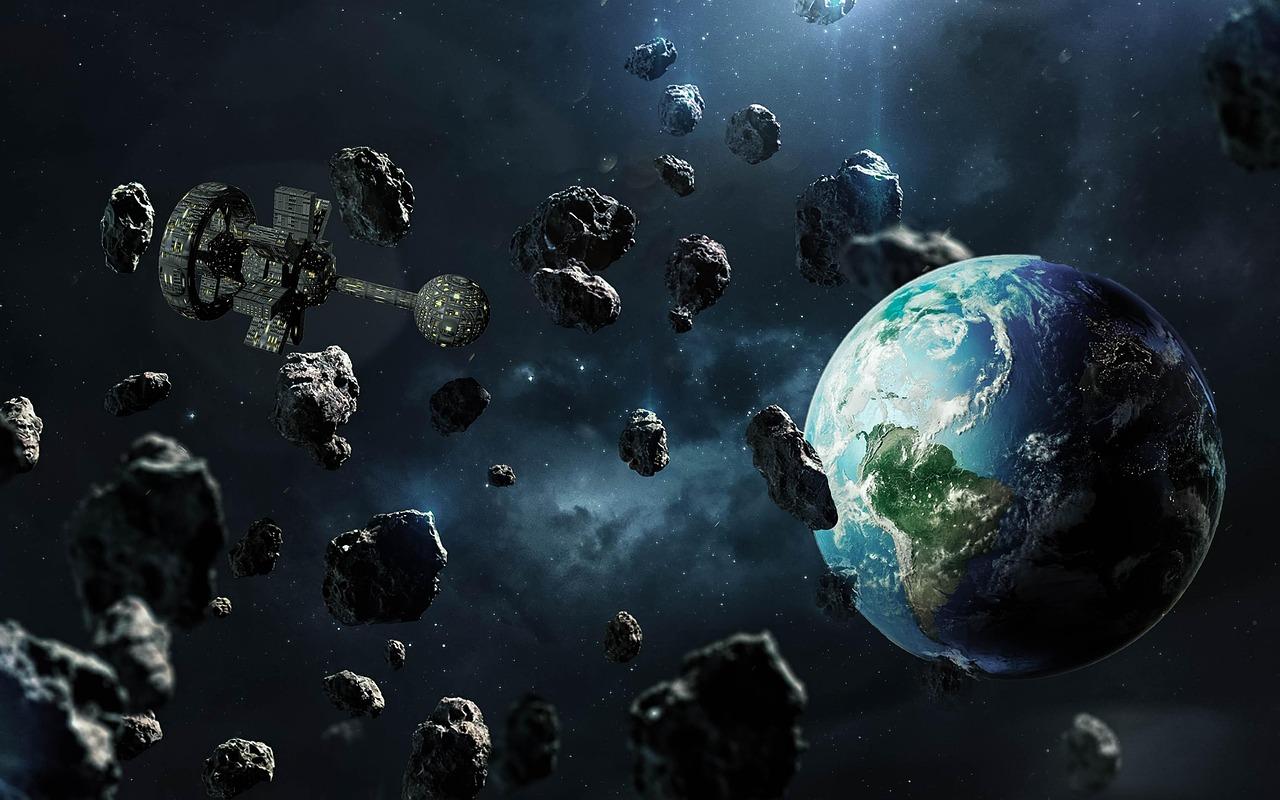 Composición artística de la Tierra rodeada de asteroides en el espacio, mostrando la proximidad de los objetos cercanos a la Tierra.