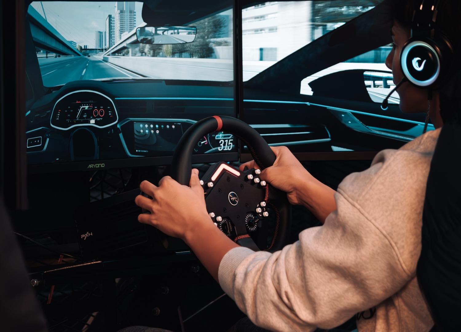 Setup de simracing profesional con equipo avanzado para carreras virtuales y visualización de circuito
